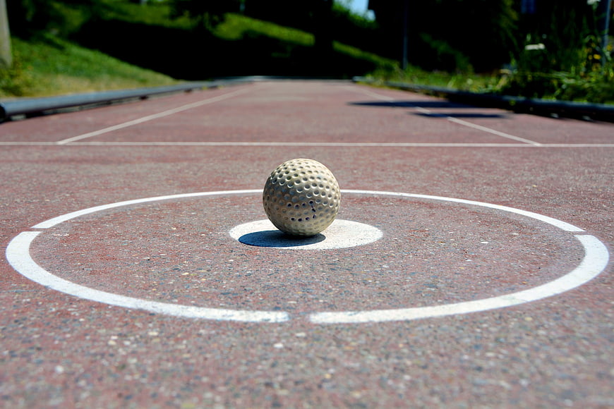 Golf Ball Resting On Mini Golf Course Center Circle