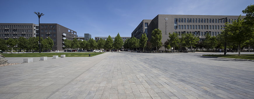 Wide View of Modern University Campus Plaza with Paved Walkway