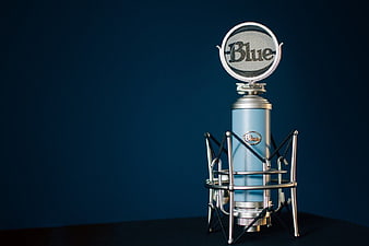 Blue Retro Microphone on Dark Blue Background
