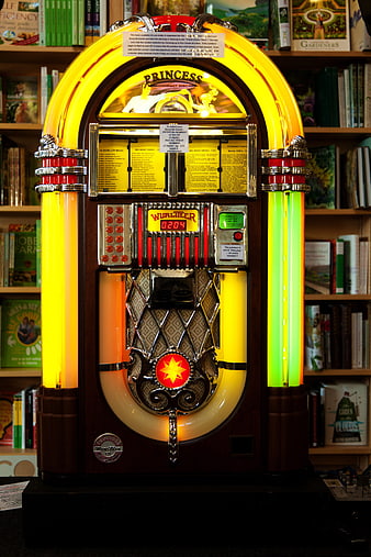 Vintage Wurlitzer Princess Jukebox With Neon Lights In Bookstore