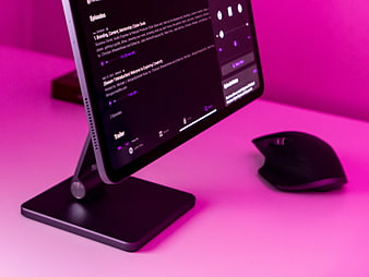 iPad on Stand with Mouse on Pink Desk