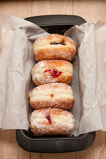 Freshly Baked Jam-Filled Donuts in Black Tray