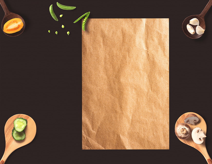 Flat lay fresh vegetables on wooden spoons with brown paper menu template