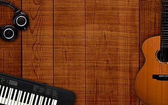 Music instruments on wooden background with copyspace
