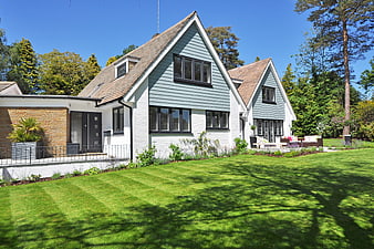 Modern Scandinavian House with Green Lawn and Garden