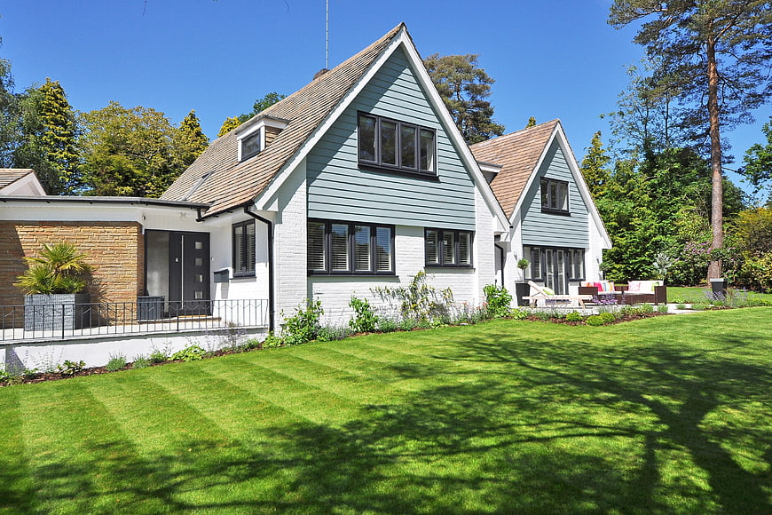 Modern Scandinavian House with Green Lawn and Garden