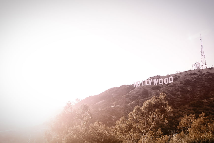 Hollywood Sign on Hillside with Bright Sun Flare