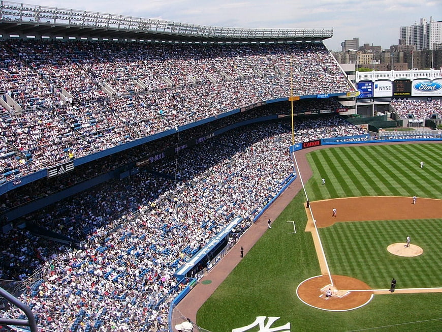 Wide angle view of crowded baseball stadium during game