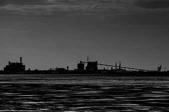 Black and white industrial waterfront silhouette