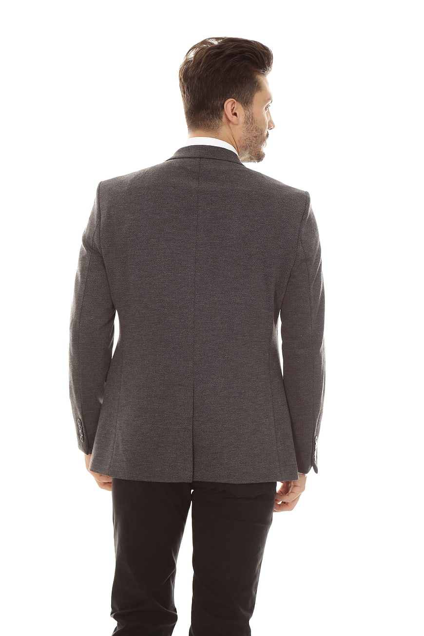 Rear View of Man Wearing Gray Herringbone Suit Jacket