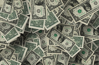 Scattered pile of one dollar bills background texture
