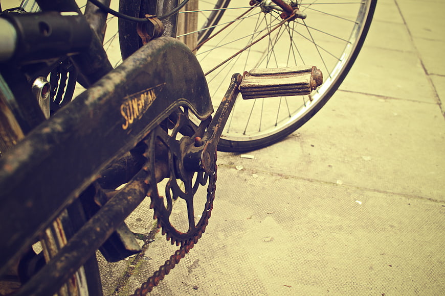 Close-up of vintage rusty bicycle chain and pedal