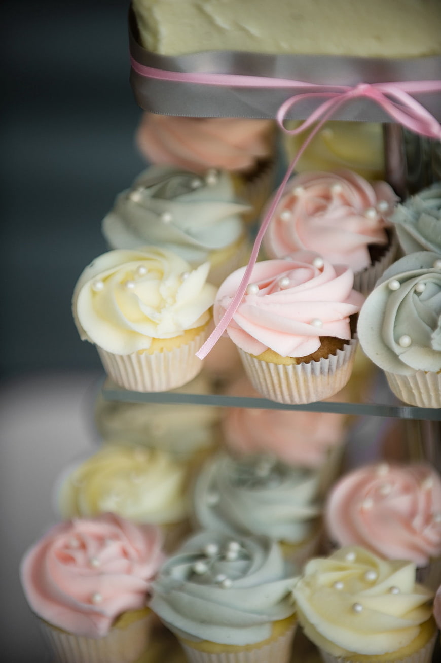 Pastel Cupcakes with Pearl Decorations on Tiered Stand