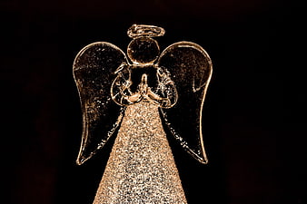 Golden Glitter Christmas Angel Ornament on Black Background