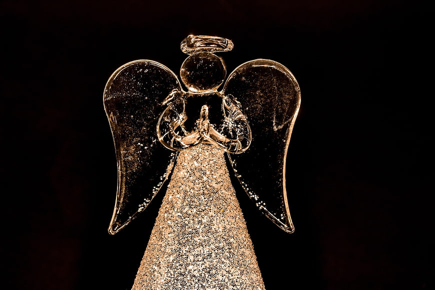 Golden Glitter Christmas Angel Ornament on Black Background
