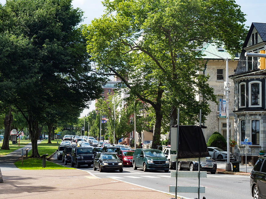 Busy Urban Street with Traffic and Historic Buildings