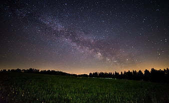 Milky Way Galaxy Over Green Meadow Night Sky