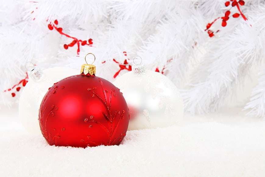 Red and White Christmas Ornaments on White Snow