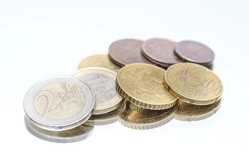 Pile of Euro Coins on White Background
