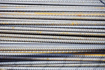 Stack of rusty steel rebar construction material