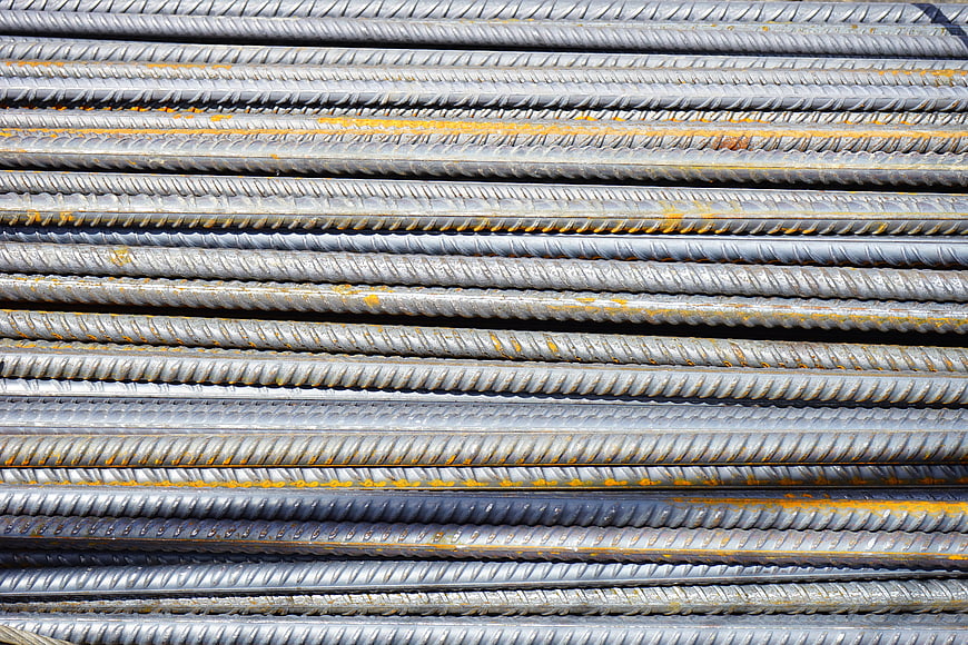 Stack of rusty steel rebar construction material