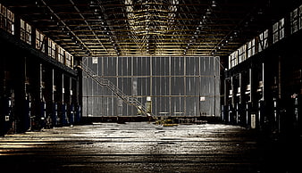 Dark Abandoned Industrial Factory Hall Interior With Dramatic Lighting