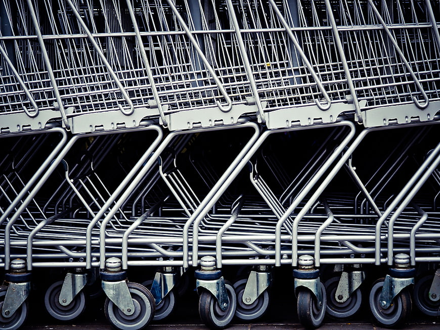 Row of Nested Metal Shopping Carts Close Up