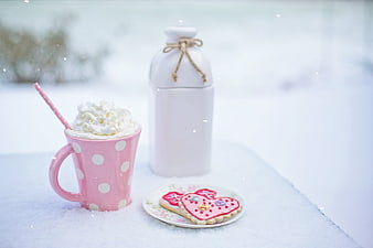 Pink Polka Dot Mug with Hot Chocolate and Heart Cookies in Snow