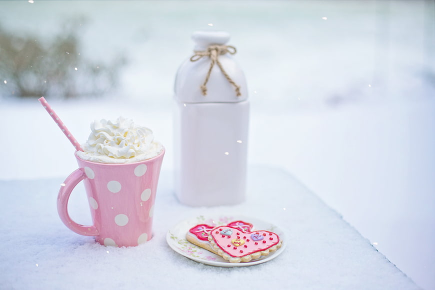 Pink Polka Dot Mug with Hot Chocolate and Heart Cookies in Snow