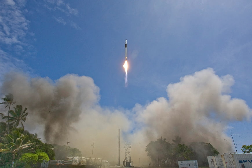 SpaceX Falcon 9 Rocket Launch with Smoke Plume