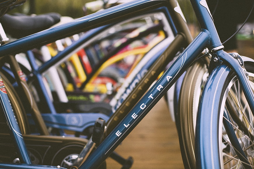 Close-up of Blue Electra Bicycle Frame in Bike Shop