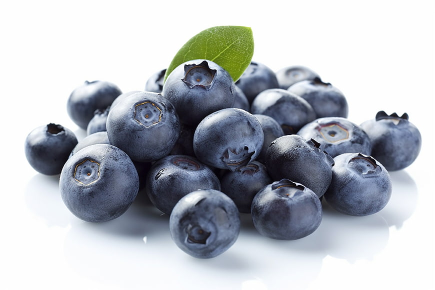 Fresh Blueberries with Green Leaf on White Background