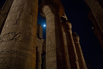 Ancient Egyptian Columns at Night with Moon