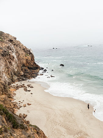 High Angle View of Secluded Beach with Cliffs and Ocean