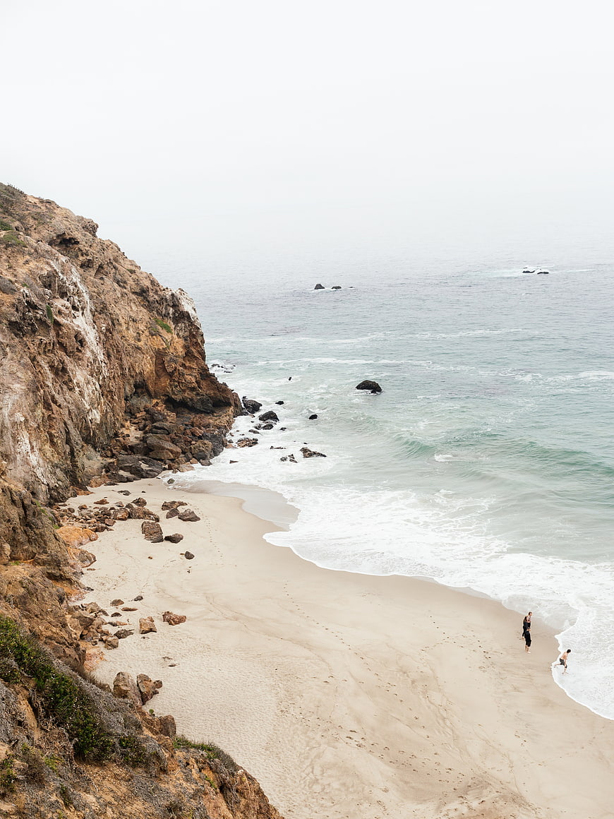 High Angle View of Secluded Beach with Cliffs and Ocean