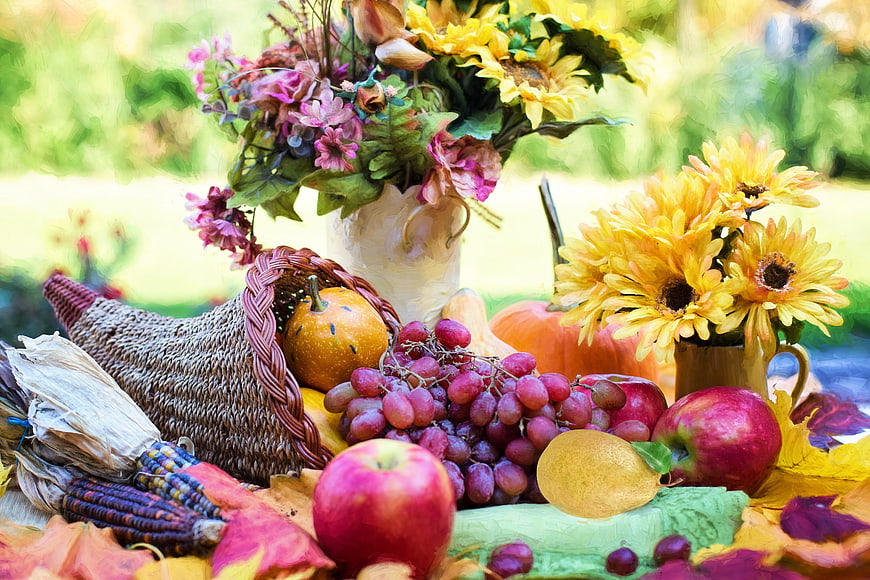 Autumn Harvest Cornucopia with Fruits, Flowers, and Pumpkins