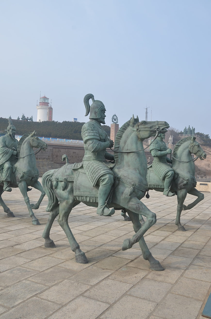Bronze statues of ancient Chinese cavalry warriors on horseback