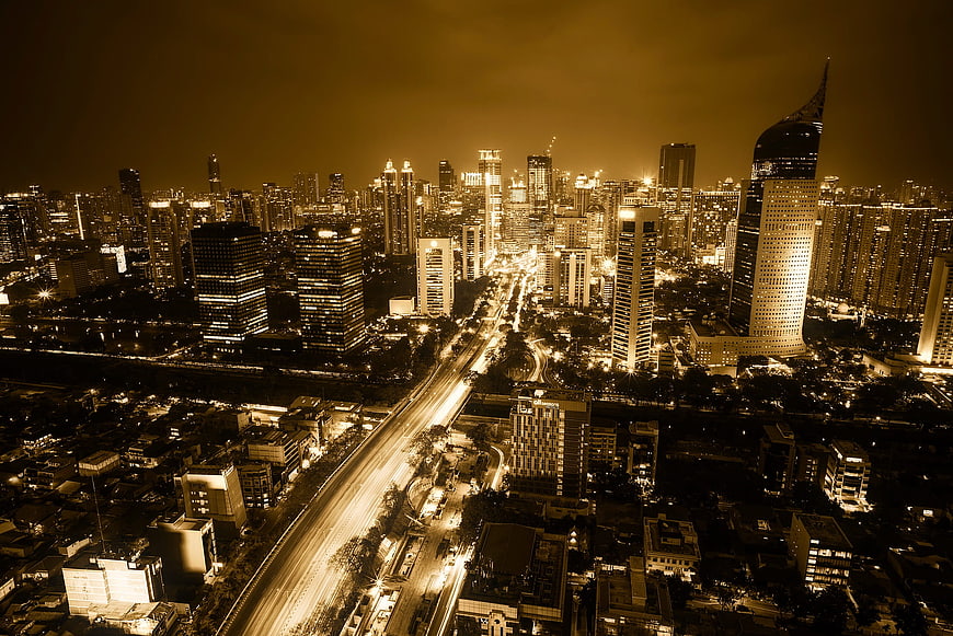 Aerial Night View of Jakarta Cityscape with Sepia Tone