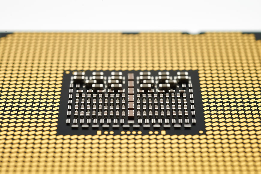 Macro Close-Up of Gold CPU Processor Pins and Contacts