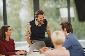Happy business team meeting in modern office