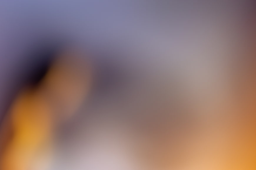 Abstract Blurred Gradient Background with Purple and Orange Hues