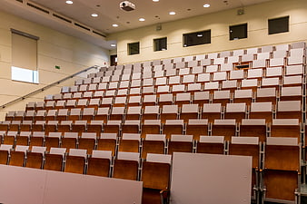Empty university lecture hall with tiered seating