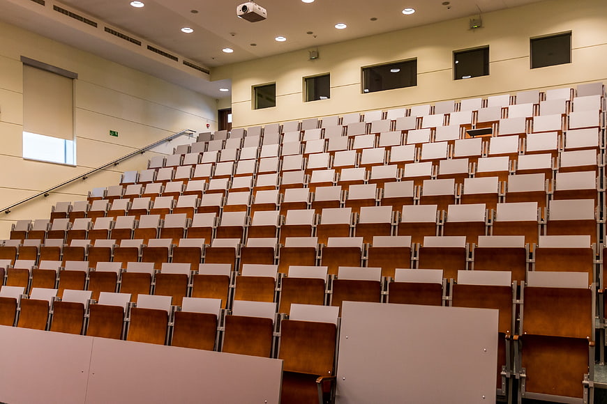 Empty university lecture hall with tiered seating