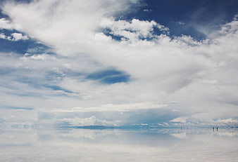 Salar de Uyuni Sky Mirror Reflection with Tiny Figures