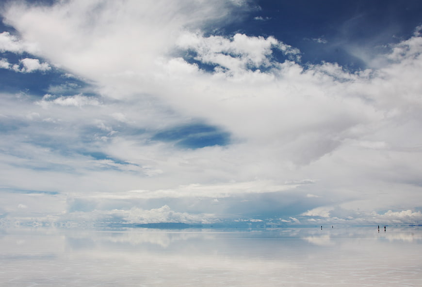 Salar de Uyuni Sky Mirror Reflection with Tiny Figures