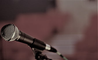 Close-up of dynamic vocal microphone on stand