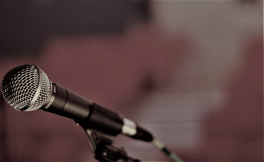 Close-up of dynamic vocal microphone on stand