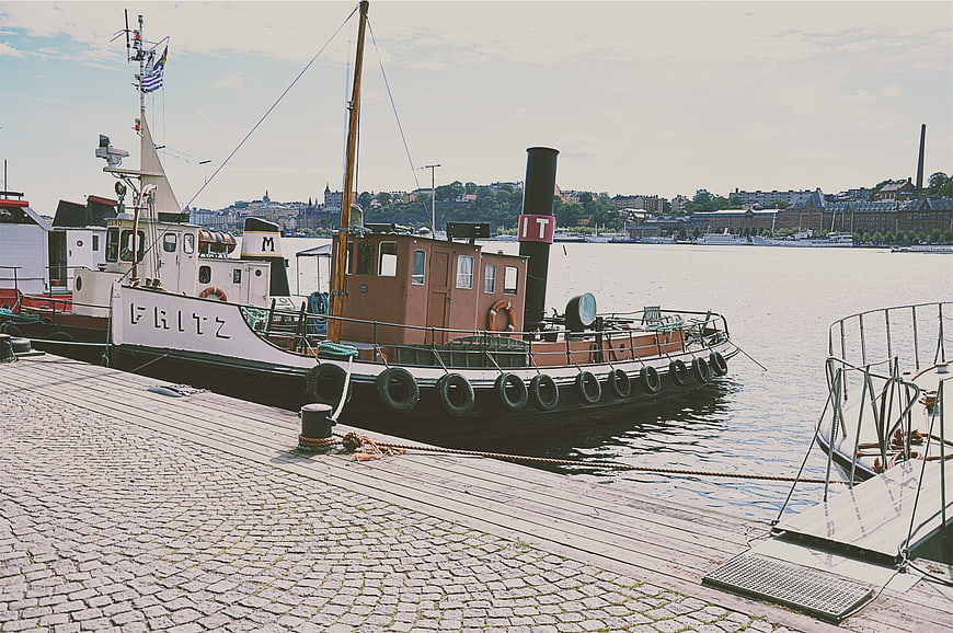 Vintage Steamboat Fritz Docked at Cobblestone Harbor