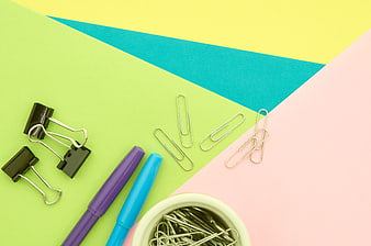 Colorful Office Supplies Flat Lay on Geometric Background