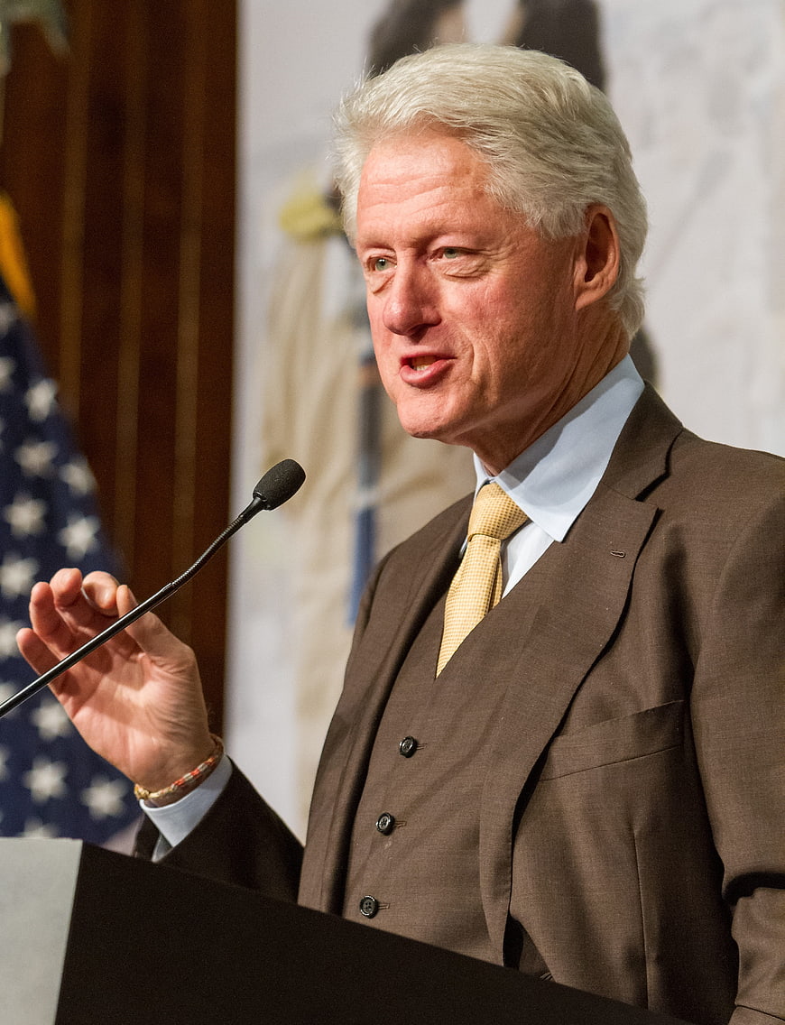 Bill Clinton Speaking at a Podium